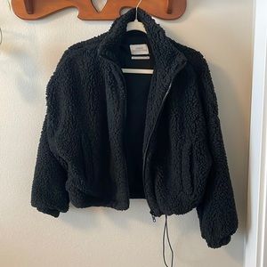 Urban Ourfitters Black Teddy Zip up Fleece Jacket. Draw string to cinch waist.